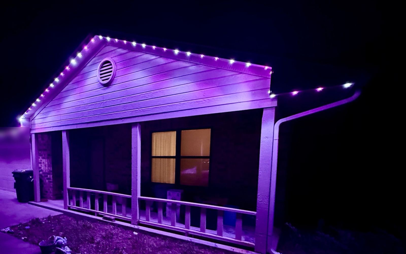 Real installed home with Purple permanent lighting behind the fascia