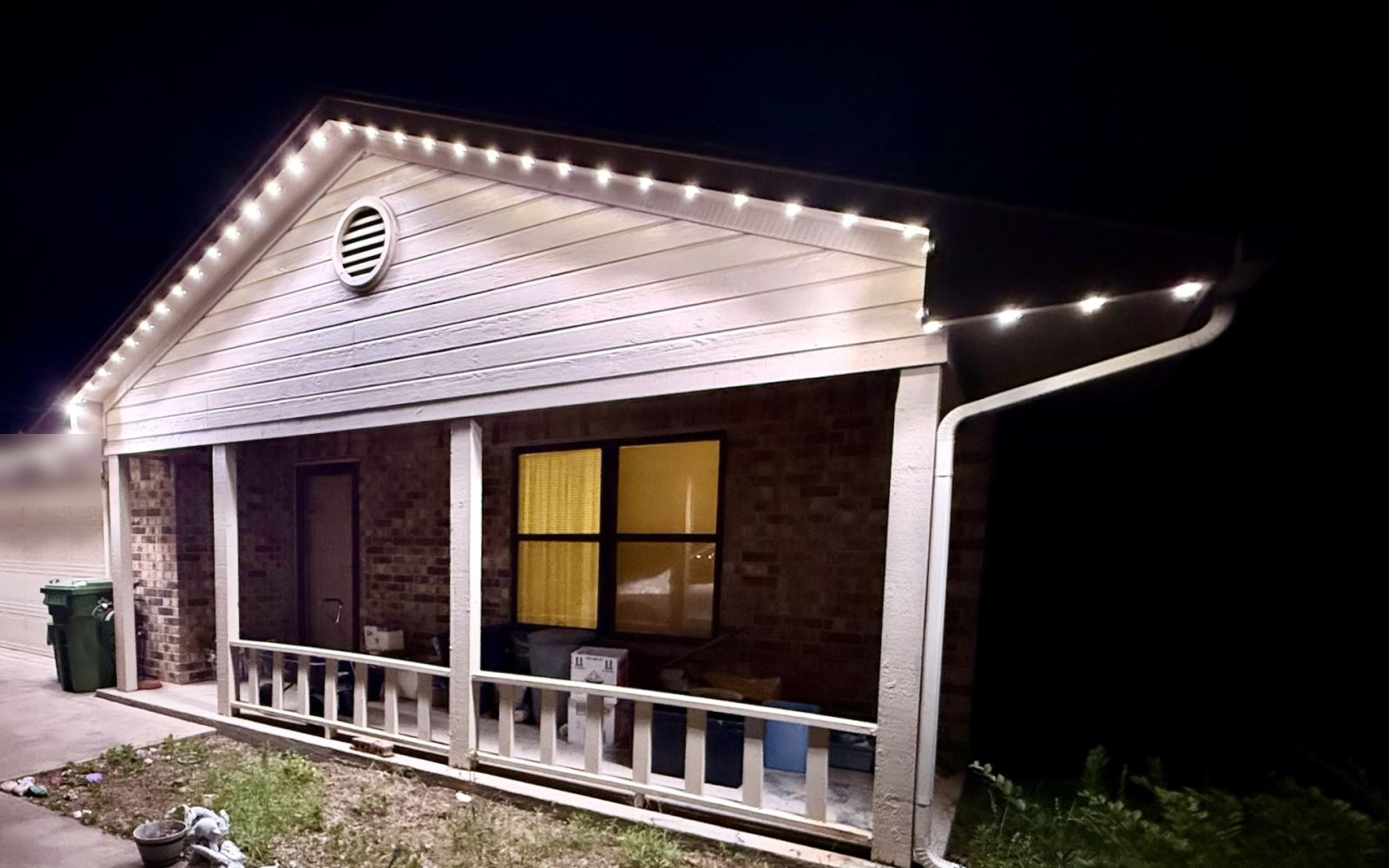 Real installed home with Cool White permanent lighting behind the fascia