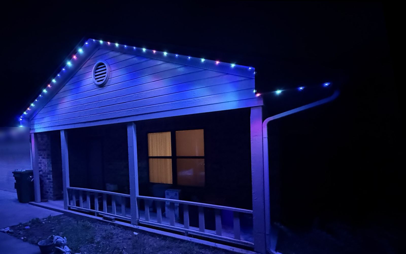 Real installed home with Winter Multi permanent lighting behind the fascia