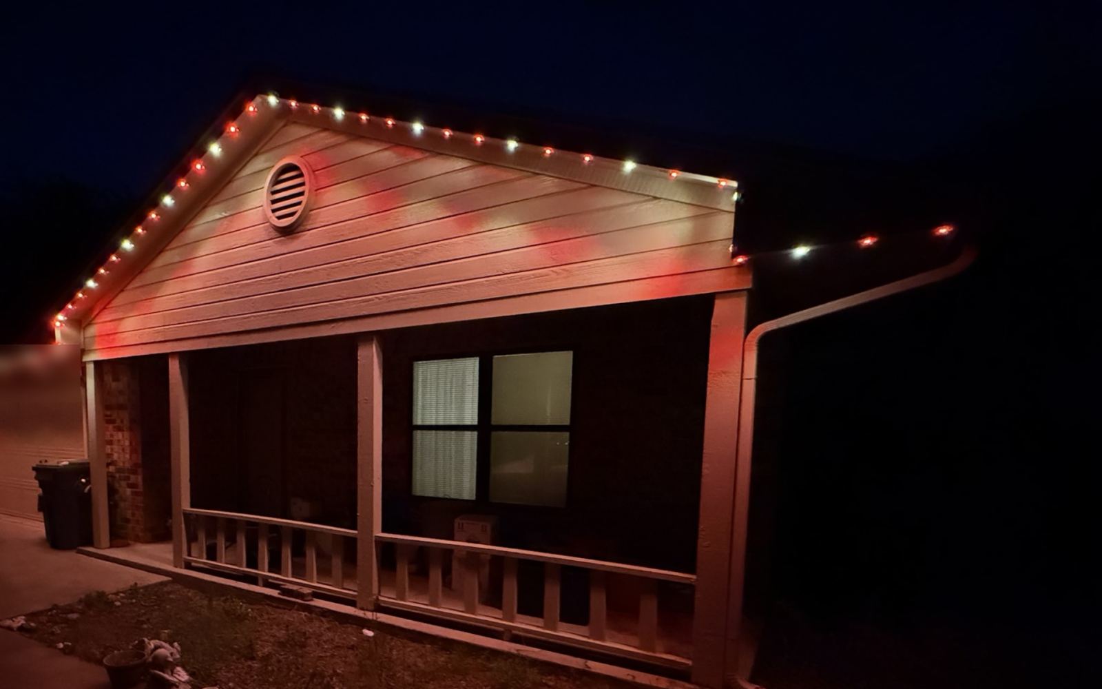 Real installed home with Halloween permanent lighting behind the fascia