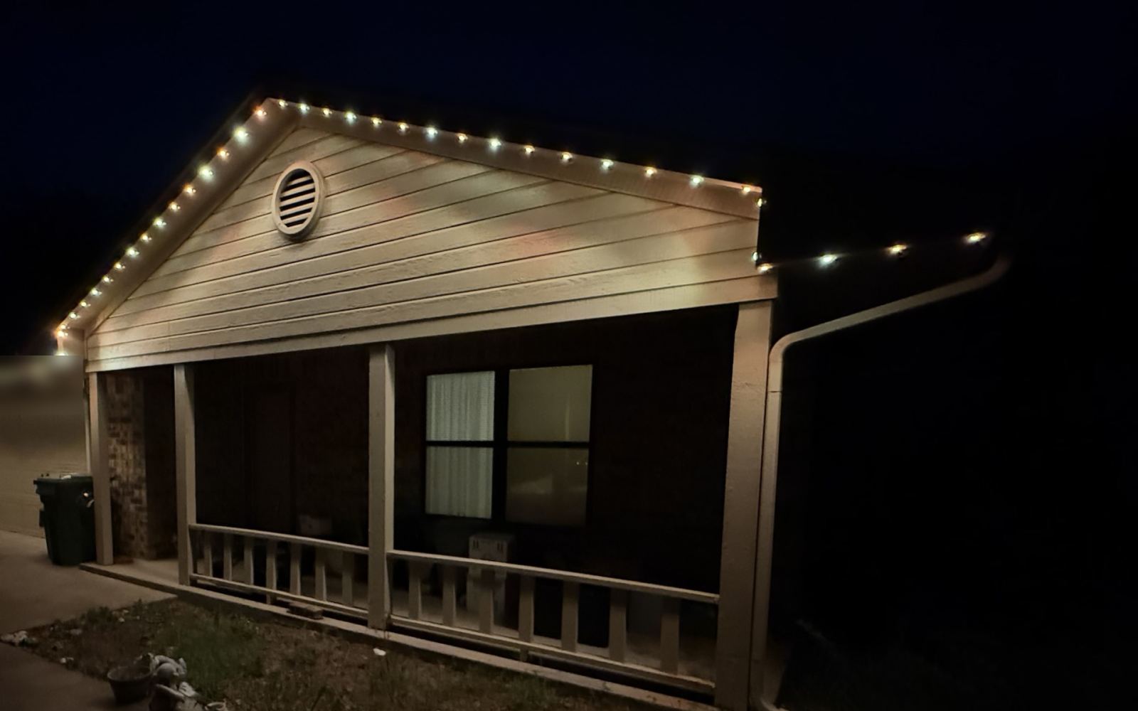 Real installed home with Evening Dim permanent lighting behind the fascia