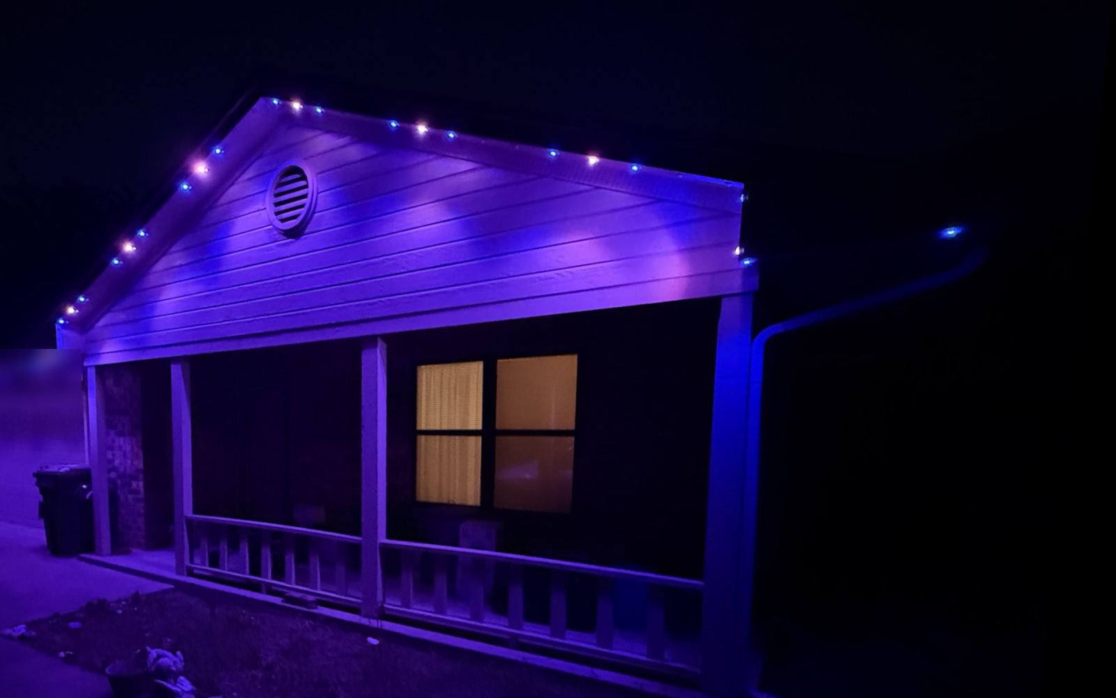 Real installed home with Game Night permanent lighting behind the fascia